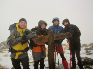 Wet and cold but still smiling on the tops